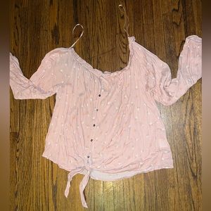 Off shoulder pink top.